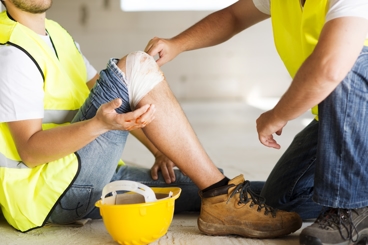 Injured Worker with Bandaged Knee